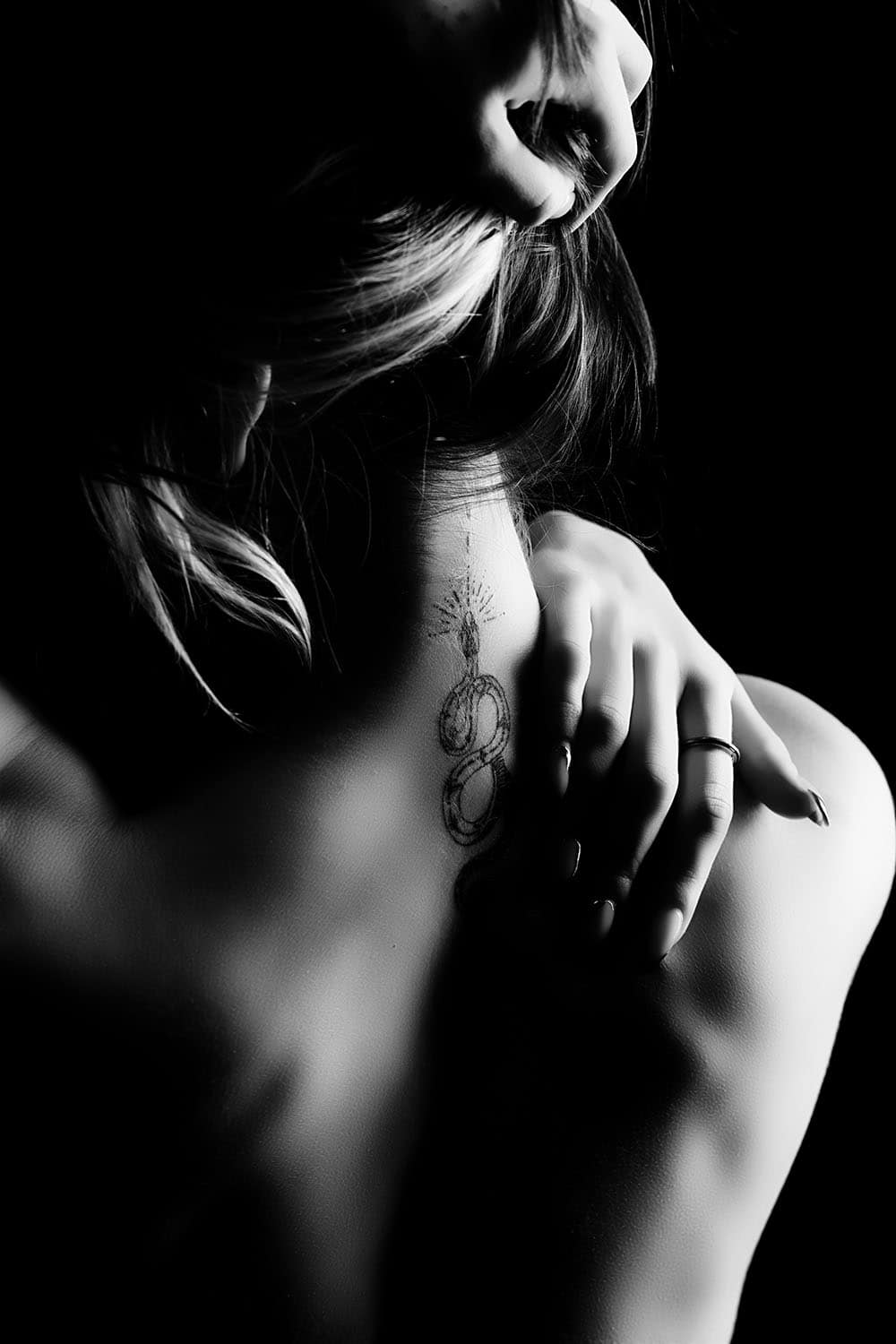 Elegant boudoir photography portraits captured in soft light